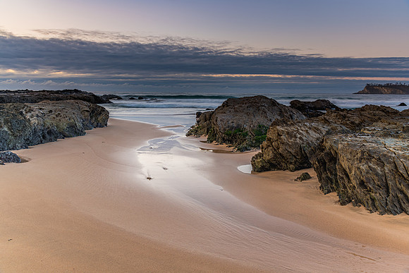 Sunrise seascape and low cloud bank