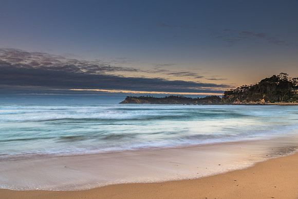 Sunrise seascape and low cloud bank