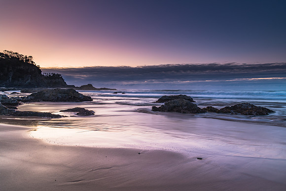 Sunrise seascape and low cloud bank