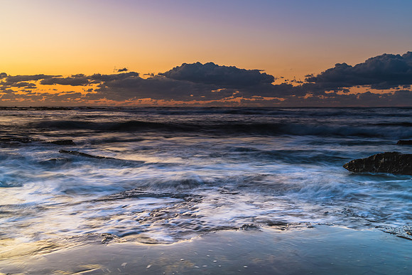 Sunrise Seascape with a low cloud bank
