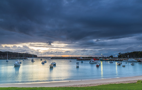 Seaside harbour overcast seascape with boats