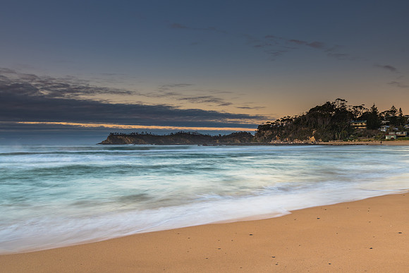 Sunrise seascape and low cloud bank