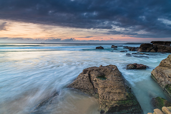 Sunrise Seascape with Clouds and Ships on the Horizon