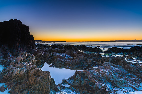 Winter's Sunrise at Surf Beach with Craggy Rocks