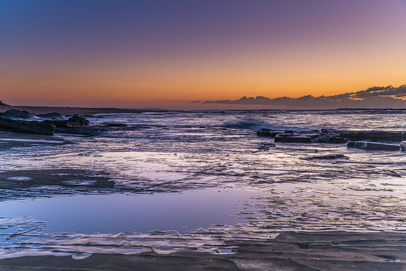 Sunrise Seascape with a low cloud bank