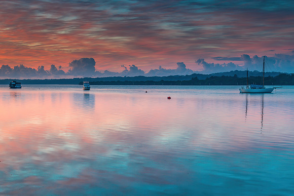 Sunrise Waterscape with High Cloud and Boats