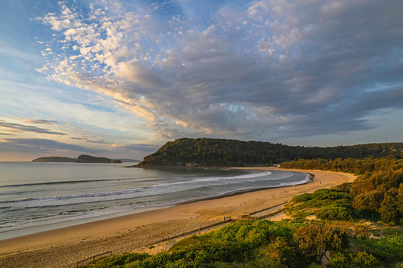 Sunrise seascape with a mix of high and medium clouds