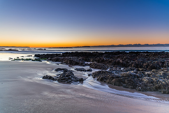 Winter's Sunrise at Surf Beach with Craggy Rocks