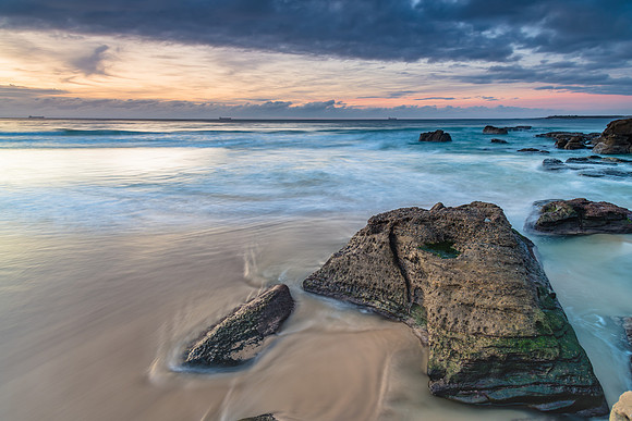 Sunrise Seascape with Clouds and Ships on the Horizon