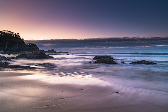 Sunrise seascape and low cloud bank