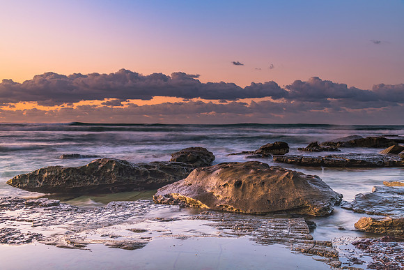 Sunrise Seascape with a low cloud bank