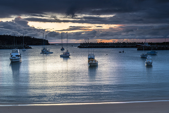 Seaside harbour overcast seascape with boats