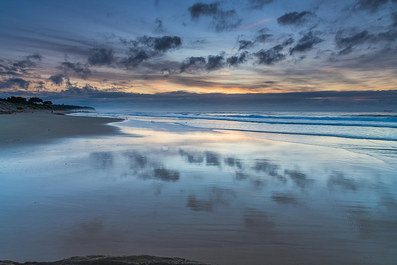 Sunrise Seascape with Clouds and Ships on the Horizon