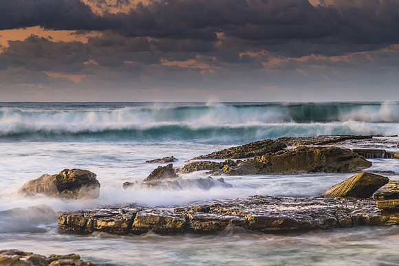 Sunrise Seascape with a low cloud bank