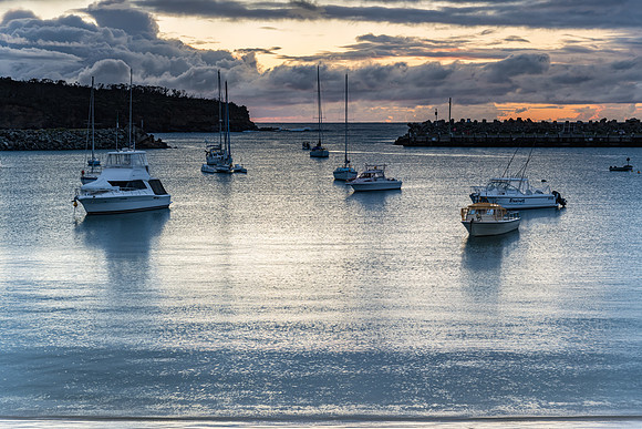 Seaside harbour overcast seascape with boats