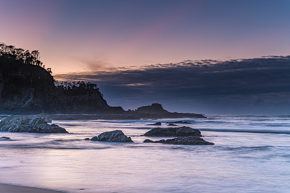 Sunrise seascape and low cloud bank