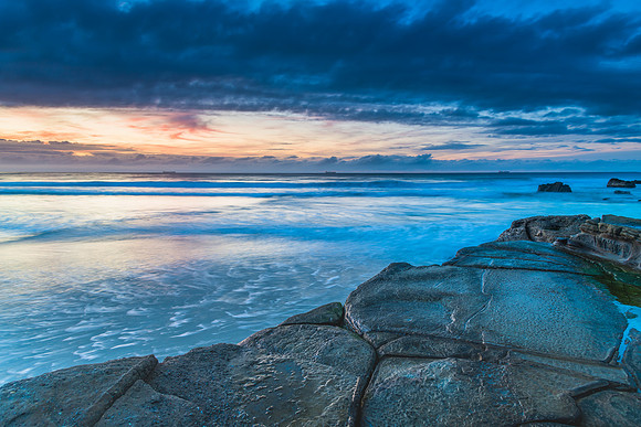 Sunrise Seascape with Clouds and Ships on the Horizon