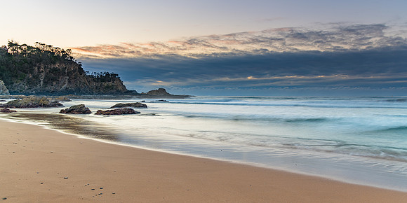 Sunrise seascape panorama and low cloud bank