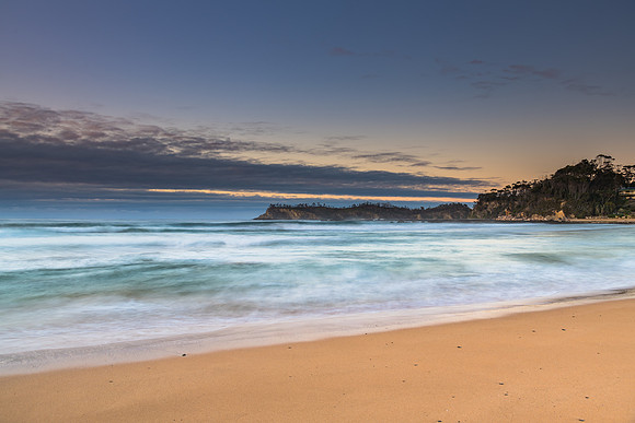 Sunrise seascape and low cloud bank