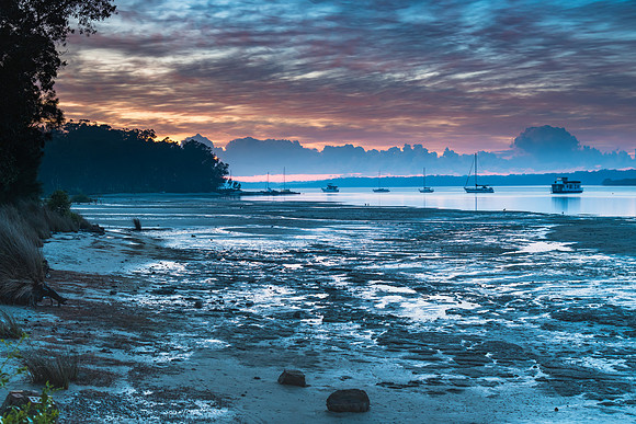 Sunrise Waterscape with High Cloud and Boats