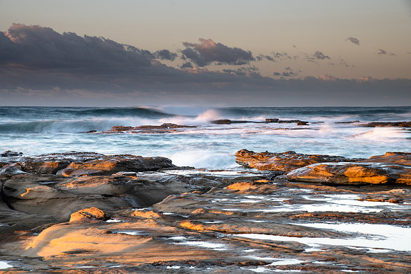 Sunrise Seascape with a low cloud bank