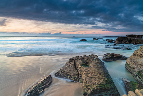 Sunrise Seascape with Clouds and Ships on the Horizon