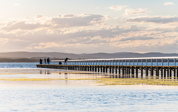 Sunset light over the Lake and the long jetty