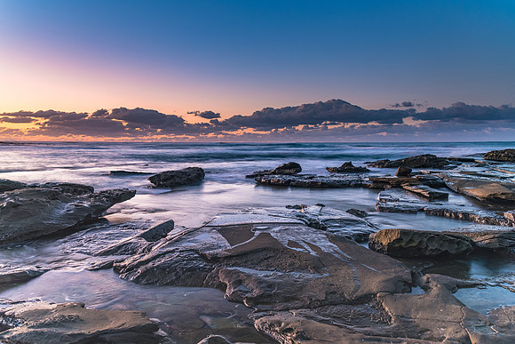 Dawn Seascape with a low cloud bank