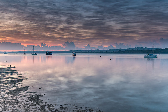 Sunrise Waterscape with High Cloud and Boats