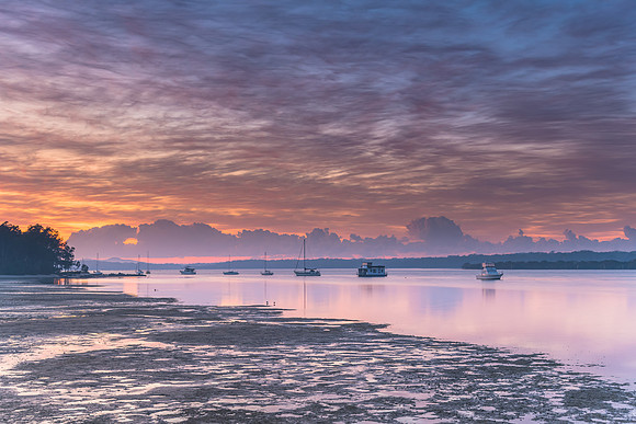 Sunrise Waterscape with High Cloud and Boats