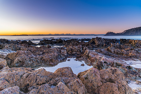 Winter's Sunrise at Surf Beach with Craggy Rocks