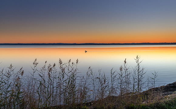 Sunset over the Lake with Clear Skies