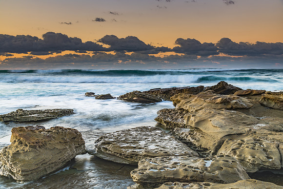 Sunrise Seascape with a low cloud bank