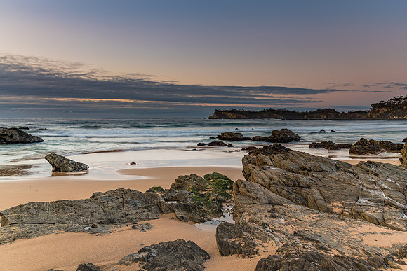 Sunrise seascape and low cloud bank