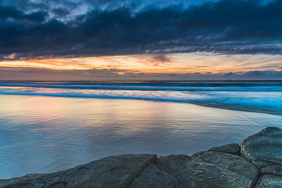 Sunrise Seascape with Clouds and Ships on the Horizon