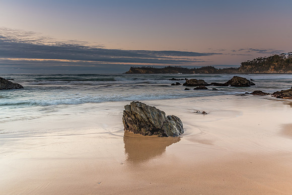 Sunrise seascape and low cloud bank