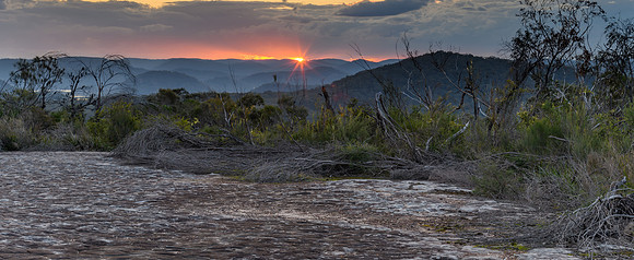 Australian Bush Sunset Panorama with Tessellated Rock and Sunbur