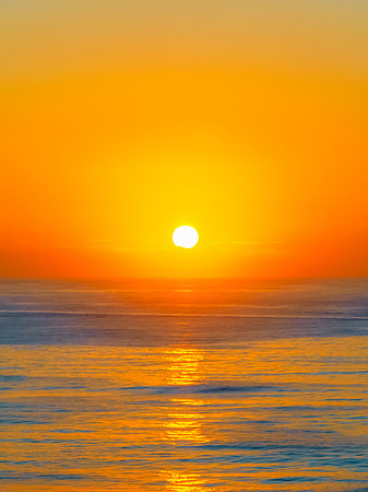 Aerial sunrise at the beach with clear skies