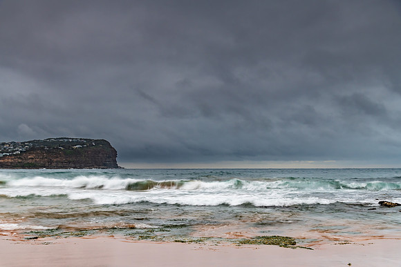 Rainy day sunrise at the beach