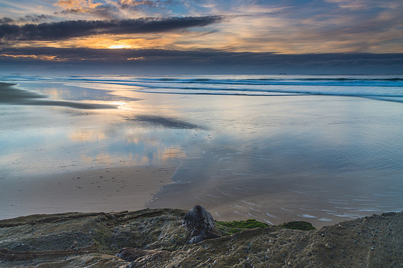 Sunrise Seascape with Clouds and Ships on the Horizon