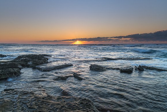 Sunrise Seascape with a low cloud bank
