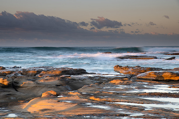 Sunrise Seascape with a low cloud bank