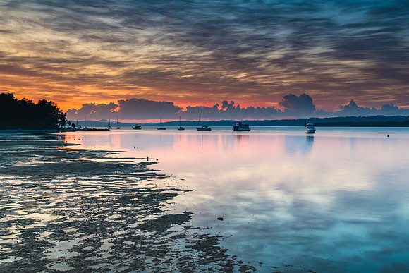 Sunrise Waterscape with High Cloud and Boats