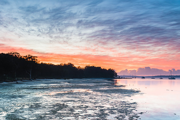 Sunrise Waterscape with High Cloud and Boats