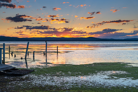 Sunset lights up the sky over the Lake