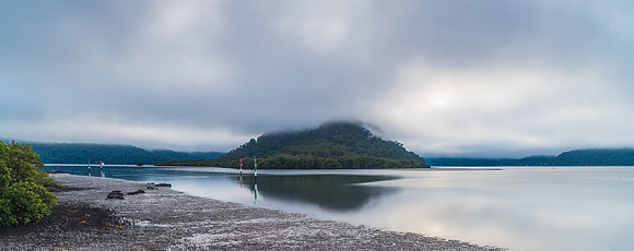 Misty morning panorama at the river