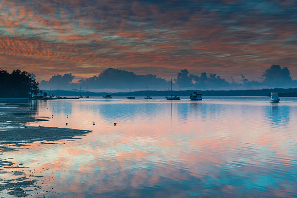 Sunrise Waterscape with High Cloud and Boats