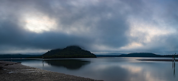 Misty morning panorama at the river