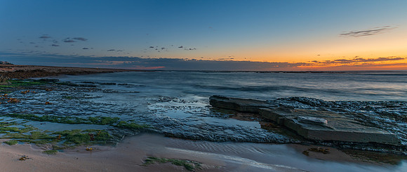 Rocky coastline panorama sunrise seascape