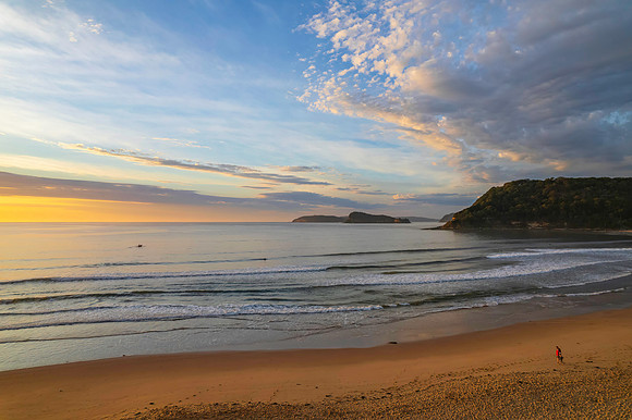 Sunrise seascape with a mix of high and medium clouds